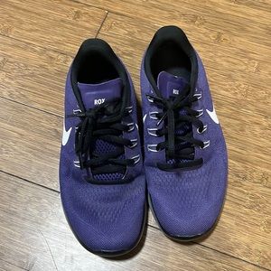 Purple Nike FreeRuns women’s size 8.